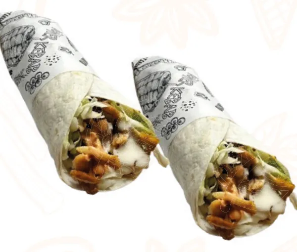 Two kebab rolls wrapped in paper
