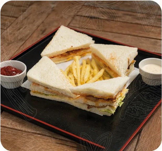 Club sandwich triangles with french fries